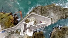 "Every day at Plazuela Sanchez Taboada, down in Mazatlan Mexico, a cliff diver risks his life for some pesos and the cheer of the crowd," said photographer Alejandro Ochoa.