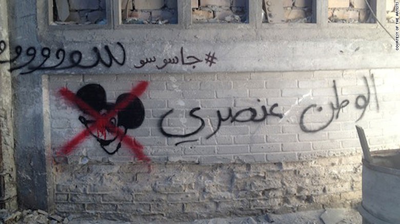 One of the artists, Heba Amin, says they did it because the show portrays world events inaccurately. The show launched in 2011 and has focused on Islamist extremism and terror in the Middle East. The larger graffiti slogan reads: &quot;Homeland is racist.&quot; 