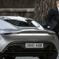 FILE - In this Saturday, Feb. 21, 2015 file photo, actor Daniel Craig steps out of a sports car during the shooting of the latest James Bond movie 'Spectre', in Rome. (AP Photo/Angelo Carconi, Ansa)