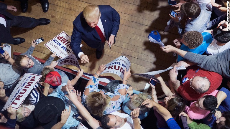 BURLINGTON, IA - OCTOBER 21: Republican presidential candidate Donald Trump greets guests after speaking at a campaign rally at Burlington Memorial Auditorium on October 21, 2015 in Burlington, Iowa. Trump leads most polls in the race for the Republican presidential nomination. (Photo by Scott Olson/Getty Images)