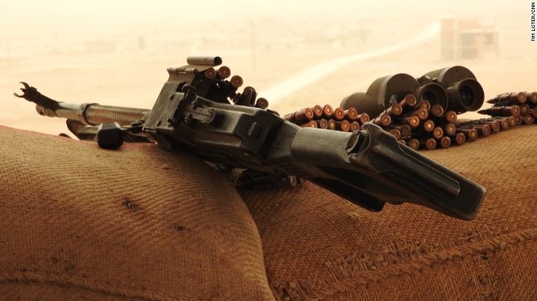 An AK-47 and ammunition belonging to Kurdish YPG fighters battling ISIS in Syria