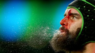 A bloodies Scott Fardy of Australia spits during the 2015 Rugby World Cup Semi Final match between Argentina and Australia at Twickenham Stadium on Sunday, October 25 in London.  