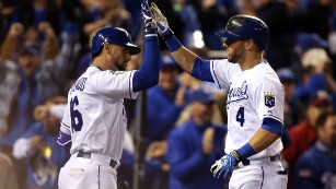 KANSAS CITY, MO - OCTOBER 27:  Alex Gordon #4 of the Kansas City Royals is greeted by Paulo Orlando #16 of the Kansas City Royals after hitting a solo home run in the ninth inning against the New York Mets during Game One of the 2015 World Series at Kauffman Stadium on October 27, 2015 in Kansas City, Missouri.  (Photo by Doug Pensinger/Getty Images)