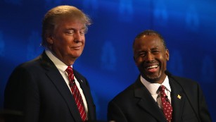 BOULDER, CO - OCTOBER 28:  Presidential candidates Donald Trump (L) and Ben Carson smile during the CNBC Republican Presidential Debate at University of Colorados Coors Events Center October 28, 2015 in Boulder, Colorado.  Fourteen Republican presidential candidates are participating in the third set of Republican presidential debates.  (Photo by Justin Sullivan/Getty Images)