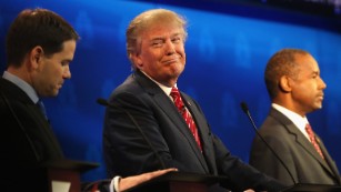 BOULDER, CO - OCTOBER 28:  Presidential candidate Donald Trump (C) smiles while Sen. Marco Rubio (L)   and Ben Carson look on during the CNBC Republican Presidential Debate at University of Colorados Coors Events Center October 28, 2015 in Boulder, Colorado.  Fourteen Republican presidential candidates are participating in the third set of Republican presidential debates.  (Photo by Justin Sullivan/Getty Images)