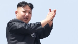 North Korean leader Kim Jong-Un (L) applauds during a military parade in honour of the 100th birthday of the late North Korean leader Kim Il-Sung in Pyongyang on April 15, 2012. North North Korean leader Kim Jong-Un delivered his first ever public speech at a major military parade in Pyongyang to mark 100 years since the birth of the country&#39;s founder Kim Il-Sung. AFP PHOTO / Ed Jones (Photo credit should read Ed Jones/AFP/Getty Images)