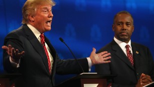 BOULDER, CO - OCTOBER 28:  Presidential candidates Donald Trump (L) speaks while Ben Carson looks on during the CNBC Republican Presidential Debate at University of Colorados Coors Events Center October 28, 2015 in Boulder, Colorado.  Fourteen Republican presidential candidates are participating in the third set of Republican presidential debates.  (Photo by Justin Sullivan/Getty Images)
