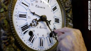 PLANTATION, FL- NOVEMBER 02:  Howie Brown adjusts the time on a clock back one hour for the end of day light savings time at Brown's Old Time Clock Shop November 2, 2007 in Plantation, Florida. The end of daylight-saving time goes into effect this weekend and everyone is reminded to set their clock back one hour beginning at 2 am Sunday.  (Photo by Joe Raedle/Getty Images)