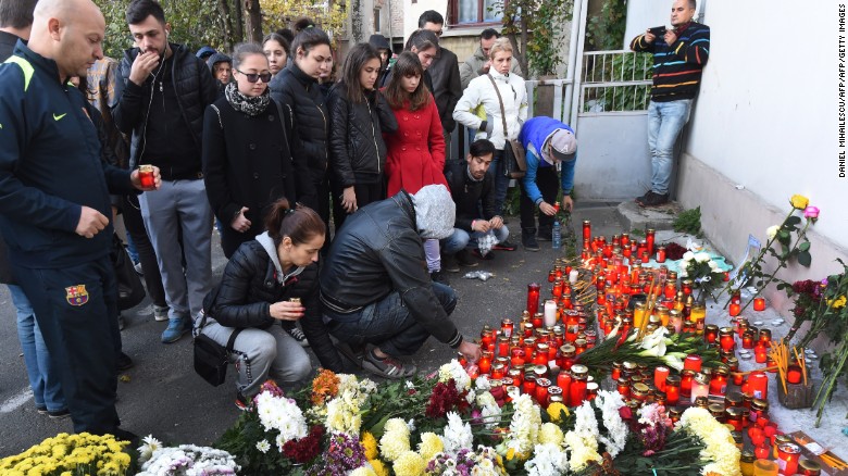 Thousands march to remember victims of Bucharest nightclub fire