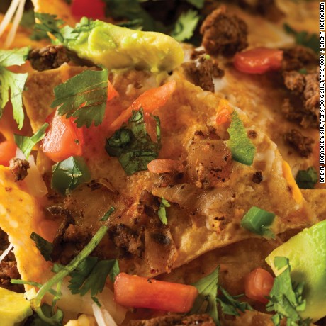 Loaded Beef and Cheese Nachos with Cilantro and Lime; Shutterstock ID 308132735