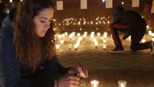 People light candles in Simferopol on November 1, 2015 in memory of the victims of a jetliner crash. Russia mourned its biggest ever air disaster after a passenger jet full of Russian tourists crashed in Egypt's Sinai, killing all 224 people on board.  A Russian airliner that crashed in Egypt broke up "in the air", an investigator said on November 1, as the bodies of many of the 224 people killed on board were flown home.  AFP PHOTO / MAX VETROVMAX VETROV/AFP/Getty Images