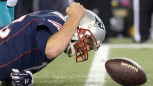 FOXBORO, MA - OCTOBER 29:  Tom Brady #12 of the New England Patriots reacts during the first quarter against the Miami Dolphins at Gillette Stadium on October 29, 2015 in Foxboro, Massachusetts.  (Photo by Darren McCollester/Getty Images)