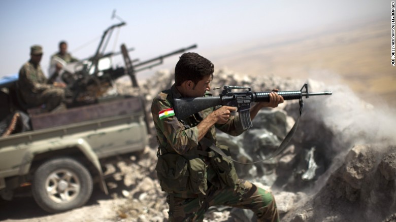 An Iraqi Kurdish Peshmerga fighter fires at Islamic-State (IS) militant positions, from his position on the top of Mount Zardak, a strategic point taken 3 days ago, about 25 kilometres east of Mosul on September 9,2014. Kurdish forces in the north have been bolstered by US strikes and took control of Mount Zardak, a strategic site that provides a commanding view of the surrounding area, a senior US officer said. AFP PHOTO/ JM LOPEZ (Photo credit should read JM LOPEZ/AFP/Getty Images)