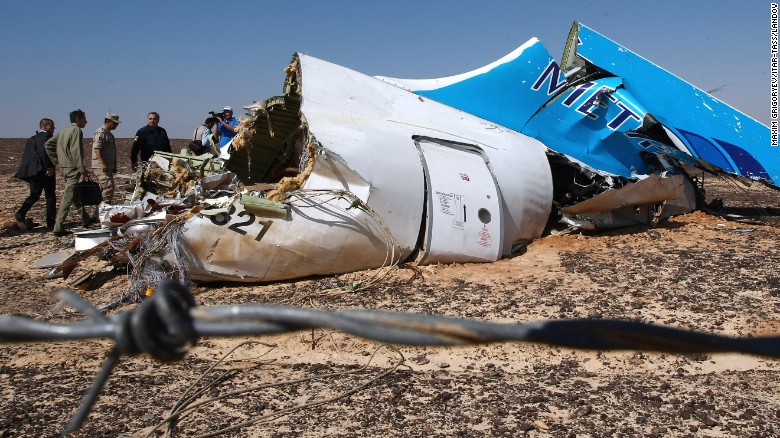 Image #: 40538776    EGYPT. NOVEMBER 1, 2015. Russia's Emergency Situations Minister Vladimir Puchkov (4th L background) at the site where a Russian aircraft crashed in Egypt's Sinai Peninsula near El Arish city. Kogalymavia Airbus A321 came down in central Sinai as it traveled from Sharm el-Sheikh to St Petersburg, killing all 217 passengers and 7 crew members on board. Maxim Grigoryev/TASS     ITAR-TASS /Landov