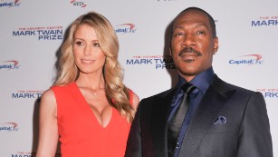 WASHINGTON, DC- OCTOBER 18:  Honoree Eddie Murphy and Paige Butcher pose on the red carpet during the 18th Annual Mark Twain Prize For Humor at The John F. Kennedy Center for Performing Arts on October 18, 2015 in Washington, DC.   (Photo by Kris Connor/Getty Images)