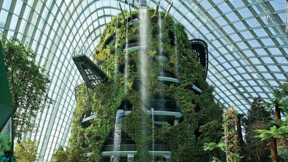 The two climates contained are the &quot;Flower Dome&quot; -- which features a cool dry environment -- and the &quot;Cloud Forest&quot; -- which features a cool and moist environment. The structure covers an area of over 20,000 square meters and features an indoor waterfall. 