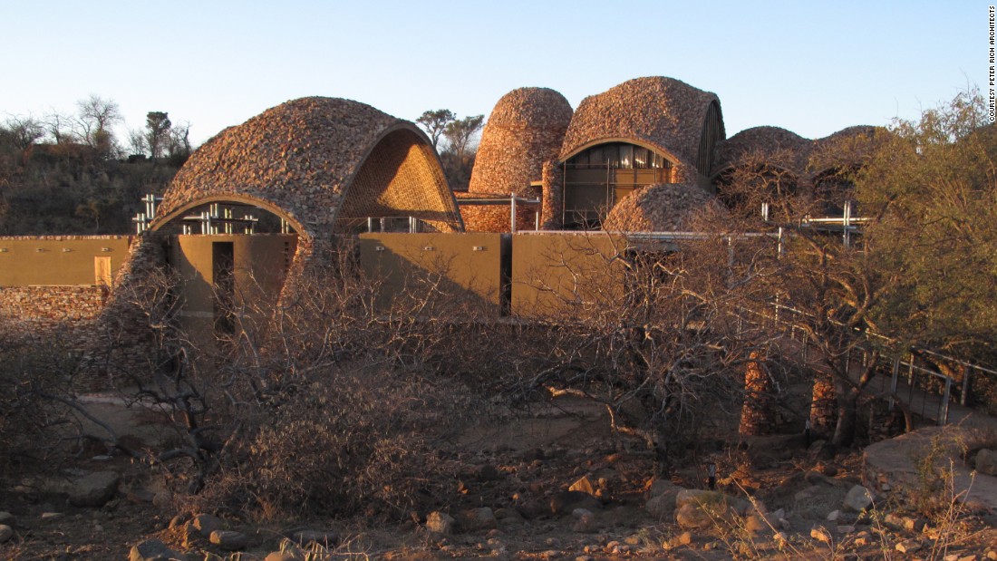 Mapungubwe Interpretation Centre is a cultural building designed to host ancient South African artifacts. Described as a &quot;poverty relief project using ecological methods and materials&quot; the architects sourced local materials (such as local pressed soil cement tiles) for building and turned to local labor forces for construction in an effort to better the community. 