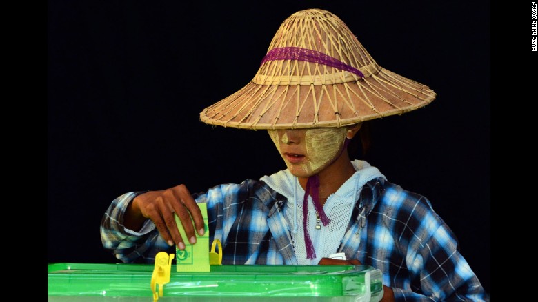 A woman casts her vote in a polling station in Naypyitaw, Myanmar, on November 8. 