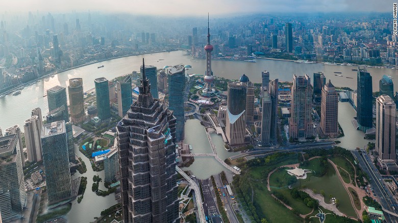 An artist&#39;s impression of how the Chinese city of Shanghai could look if temperatures rise by just two degrees Celsius. The following images show were provided by Climate Central, as part of report released November 8, 2015.