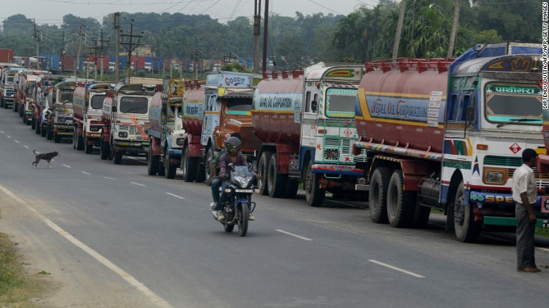 Indian trucks line up near the India-Nepal border at Panitanki on November 3, 2015. 