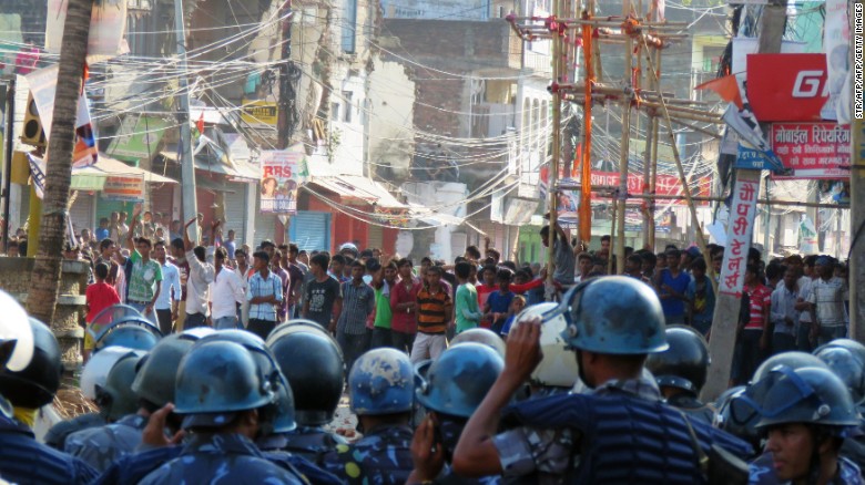 Nepalese police face off with protesters during clashes near the Nepal-India border at Birgunj, some 90 km south of Kathmandu, on November 2, 2015.