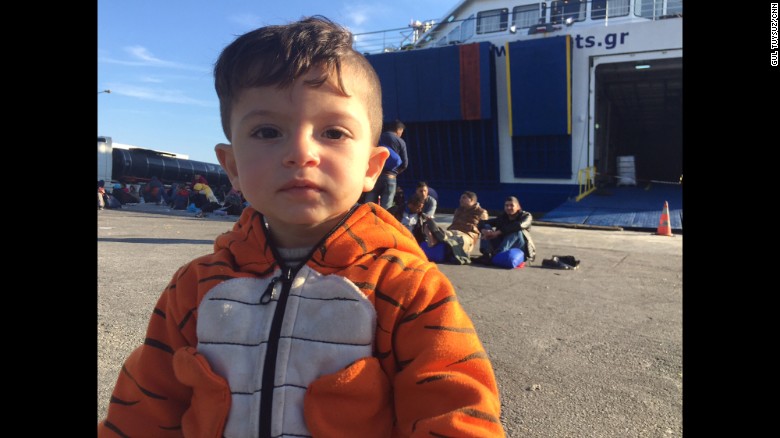 Ali is 15 months old. He's also waiting to get on a boat to Athens. His hometown of Jarablus in northern Syria is an ISIS stronghold. His uncle, who he never got to meet, was one of the first five people beheaded for attempting to resist ISIS in Jarablus.