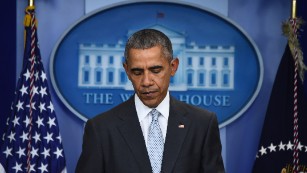 US. President Barack Obama looks down as he speaks to the press in Washington, DC on November 13, 2015, after being informed about a series of deadly attacks that rocked Paris. At least 35 people were killed as multiple shootings and explosions hit Paris, police said.