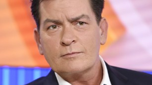 Actor Charlie Sheen appears during an interview, Tuesday, Nov. 17, 2015 on NBC's "Today" in New York. In the interview, the 50-year-old Sheen said he tested positive four years ago for the virus that causes AIDS. (Peter Kramer/NBC via AP)