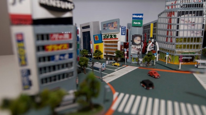 Japanese artist Inco Matsui creates mini cities using paper and glue.