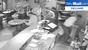 Terrifying video of terrorist misfiring at customer 