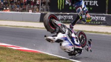 Czech motorcycle racer Karel Abraham crashes while practicing for the MotoGP event in Barcelona, Spain, on Saturday, June 13. His injuries kept him out of several races this season, but he eventually returned to competition.