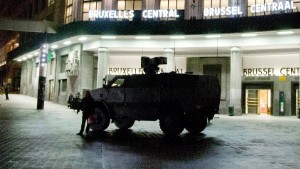 A Belgian Army vehicle is parked in front of the main train station in the center of Brussels on Saturday, Nov. 21, 2015. Belgium raised its security level to the highest degree on Saturday as the manhunt continues for extremist Salah Abdeslam who took part in the Paris attacks. The security alert shut metro's, shops, and cancelled events with high concentrations of people. (AP Photo/Virginia Mayo)