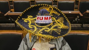Image #: 40971457    epa05034682 Jim Yates wears a Mexican sombrero with a bumper sticker while waiting for Republican 2016 US presidential candidate Donald Trump to arrive for a campaign town hall event at Wofford College in Spartanburg, South Carolina, USA, 20 November 2015. The South Carolina Republican presidential primary is 20 February 2016.  EPA/ERIK S. LESSER /LANDO