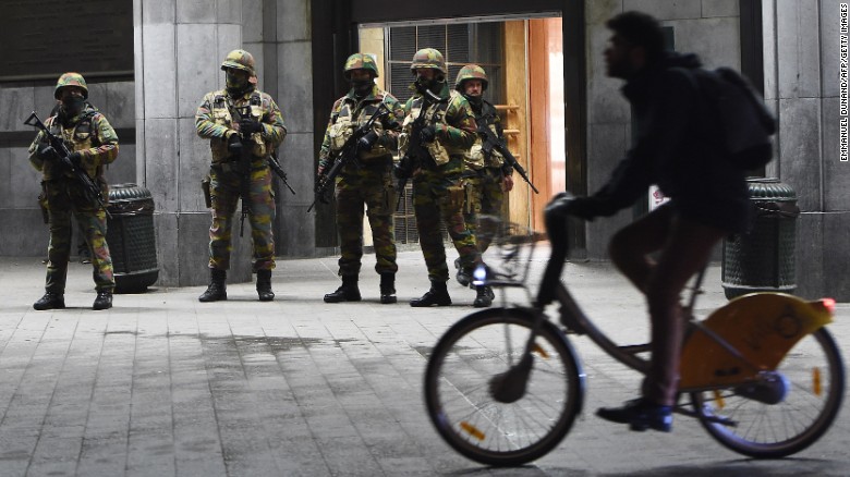 Soldiers stand guard in front of the Brussels Central Train Station on November 22, 2015 as the Belgian capital remained on the highest security alert level over fears of a Paris-style attack.     AFP PHOTO / Emmanuel Dunand        (Photo credit should read EMMANUEL DUNAND/AFP/Getty Images)