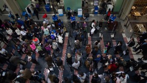 Holiday travelers line up for one of the TSA security checkpoints at Ronald Reagan National Airport (DCA) in Washington on November 26, 2013 as air traffic increases for  the Thanksgiving holiday.    AFP PHOTO/Paul J. Richards        (Photo credit should read PAUL J. RICHARDS/AFP/Getty Images)