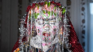 A portrait of the Bulgraian Muslim bride Fatme Robova, 20, C, after she has her traditional for the minority wedding make-up applied and was dressed on the second and final day of her wedding with Refat Atipov, 20, in their home village Ribnovo.The second day of the traditional wedding held in the mountainous village situated some 210 km south of Sofia the Bulgarian capital, as the locals say " belongs" to the family of the broom and this is the day when the boy will take his wife from the home of her parents and will escort it to his home as the tradition says. During this very important and final day of the wedding the face of the bride will be painted in white and a colorful make up will be applied. This is a sign of the bride's purity. On the second day, the family of the girl gives all the wedding dowry (cheiz in Bulgarian) outside of their home, where the entire village can see the gift-ceremony. Those are the gifts for the newly weds and the parents of the groom which will be given to them on the second day of this traditionally winter wedding. The population of this small and very beautiful village is predominantly Bulgarian speaking Muslims referred sometimes as "Pomaks".  Today, more often the people from the Bulgarian Muslim ethnic minority are defined to be Slavic Muslims and it is largely believed that they are the descendants of native Christian Bulgarians who were converted to Islam during the Ottoman rule of the Balkan region from 14th to 19th century, although their origin has been debated during the years. January, 2015, Bulgaria.