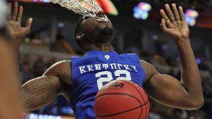 CHICAGO, IL - NOVEMBER 17:  Alex Poythress #22 of the Kentucky Wildcats gets his teeth caught in the net while dunknig against the Duke Blue Devils during the Champions Classic at the United Center on November 17, 2015 in Chicago, Illinois. Kentucky defeated Duke 74-63. (Photo by Jonathan Daniel/Getty Images)