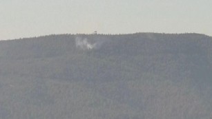 A Russian plane is seen crashing nose-first in northern Syria.