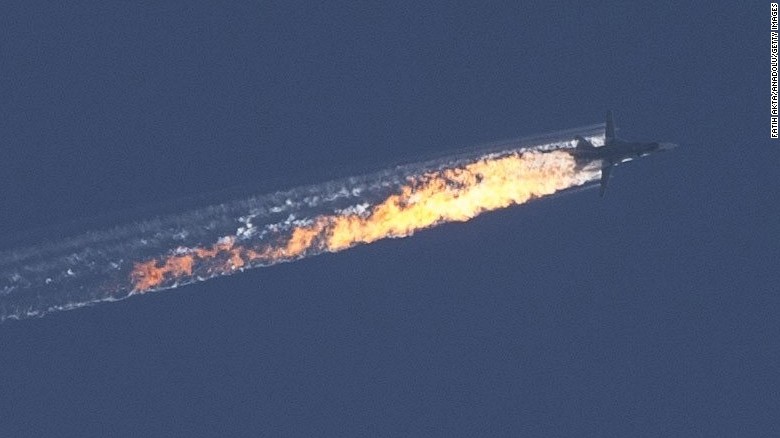 A Russian warplane goes down in Syria's Bayirbucak region, near the Turkish border, on November 24, 2015.