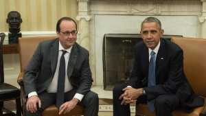 US President Barack Obama meets with his French counterpart Francois Hollande in the Oval Office at the White House in Washington, DC, on November 24, 2015. Hollande arrived Tuesday at the White House for talks with Obama on how to confront the Islamic State group in the wake of the Paris attacks. The French and US leaders were to hold a joint press conference following their meeting, part of a frantic week of shuttle diplomacy by Hollande to rally global support to fight IS.   AFP PHOTO/NICHOLAS KAMM / AFP / NICHOLAS KAMM        (Photo credit should read NICHOLAS KAMM/AFP/Getty Images)