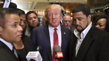 Rev. Darrell Scott, senior pastor of the New Spirit Revival Center in Cleveland Heights (R) and Republican hopeful Donald Trump  speak to the press after a meeting at Trump Tower in New York on November 30 ,2015 with prominent African American clerics. AFP PHOTO / TIMOTHY A. CLARY / AFP / TIMOTHY A. CLARY        (Photo credit should read TIMOTHY A. CLARY/AFP/Getty Images)