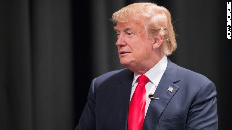 Republican presidential candidate Donald Trump speaks to guests following a town hall meeting at Des Moines Area Community College Newton Campus on November 19, 2015, in Newton, Iowa.