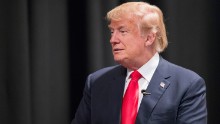 Republican presidential candidate Donald Trump speaks to guests following a town hall meeting at Des Moines Area Community College Newton Campus on November 19, 2015, in Newton, Iowa.