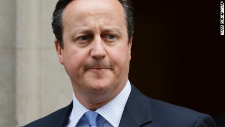 British Prime Minister David Cameron leaves 10, Downing Street in London, to go to the Houses of Parliament for a debate and vote on launching airstrikes against Islamic State extremists inside Syria, Wednesday, Dec. 2, 2015. The vote expected Wednesday evening would authorize bombing inside Syria. Britain has been participating in U.S.-led coalition attacks against IS positions in Iraq only. (AP Photo/Matt Dunham)