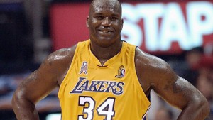 LOS ANGELES, UNITED STATES:  (FILES): This 05 June 2002 file photo shows Shaquille O'Neal of the Los Angeles Lakers during the 4th quarter of game one of the NBA Finals against the New Jersey Nets at the Staples Center in Los Angeles, CA.  According to 11 July 2004 media reports, 11-time National Basketball Association All-Star O'Neal has agreed to be traded by the Lakers to the Miami Heat for three players. The disgruntled superstar has demanded a trade from the Lakers -- a team he led to three NBA titles in the past five years.   AFP PHOTO/FILES/Lucy NICHOLSON  (Photo credit should read LUCY NICHOLSON/AFP/Getty Images)