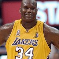 LOS ANGELES, UNITED STATES:  (FILES): This 05 June 2002 file photo shows Shaquille O'Neal of the Los Angeles Lakers during the 4th quarter of game one of the NBA Finals against the New Jersey Nets at the Staples Center in Los Angeles, CA.  According to 11 July 2004 media reports, 11-time National Basketball Association All-Star O'Neal has agreed to be traded by the Lakers to the Miami Heat for three players. The disgruntled superstar has demanded a trade from the Lakers -- a team he led to three NBA titles in the past five years.   AFP PHOTO/FILES/Lucy NICHOLSON  (Photo credit should read LUCY NICHOLSON/AFP/Getty Images)