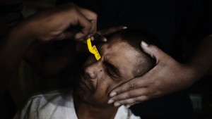 Kaly (adult) having his eyebrows removed after losing a bet in April 2012. Kaly belongs to the street gang 'Los Pokos Lokos' from the neighbourhood known as San Rafael, Guadalupe, in the Metropolitan Area of Monterrey, Nuevo Leon, Mexico. San Rafael is an area that is made up of public and informal housing projects and contains a patchwork of street gangs.  In recent years it has been severely affected by organised drug violence.  