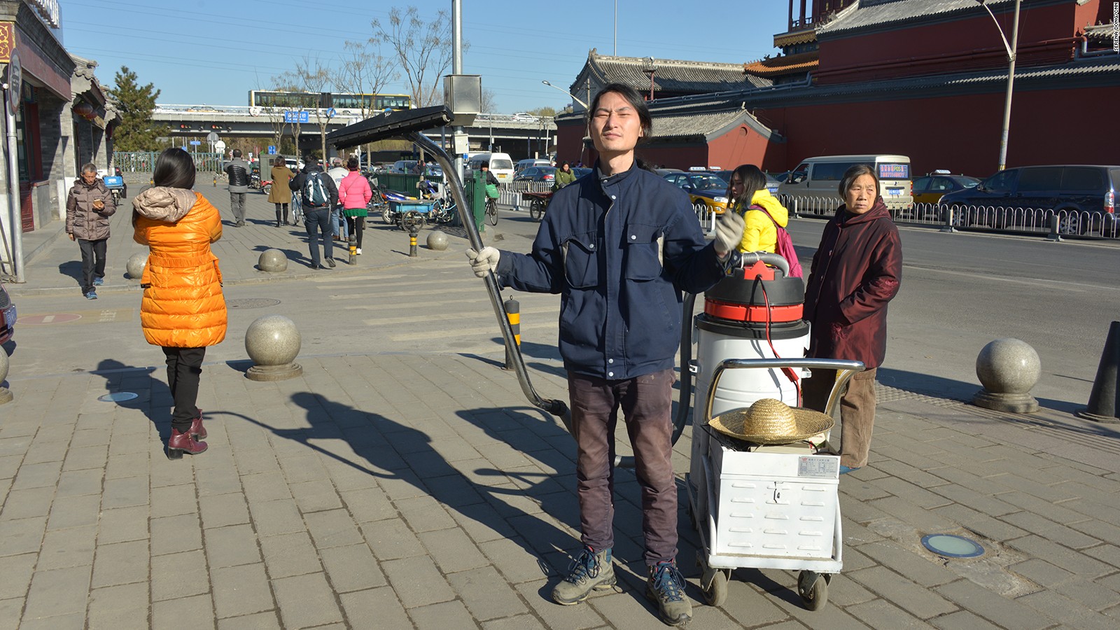 China's Brother Nut is ready to start his project by the street.