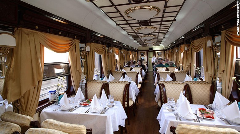 The Golden Eagle features both a restaurant car and a separate lounge. The restaurant car, pictured, serves a breakfast buffet, while lunch and dinner menus feature local specialties such as black sturgeon and red pacific salmon caviar. 