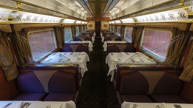 The Ghan&#39;s Queen Adelaide Restaurant. The menu highlights Australia&#39;s exotic local fare, like saltwater barramundi fish and grilled kangaroo fillet.